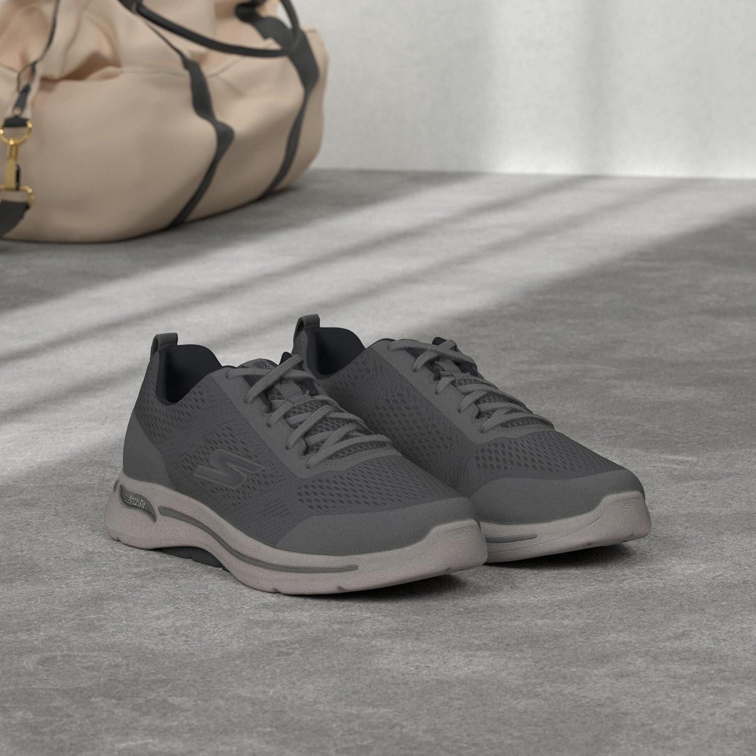 imageSkechers Mens Gowalk Arch FitAthletic Workout Walking Shoe with Air Cooled FoamSneakerGreyNavy