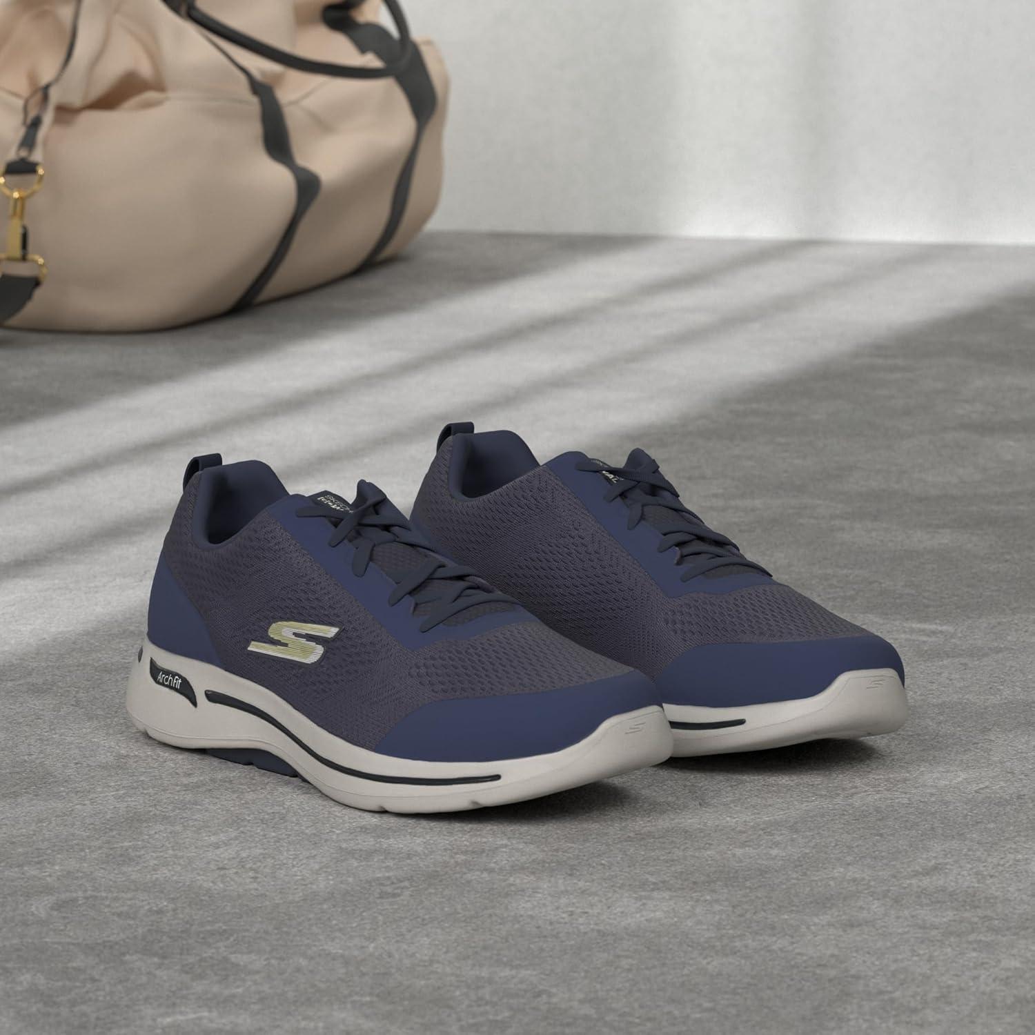 imageSkechers Mens Gowalk Arch FitAthletic Workout Walking Shoe with Air Cooled FoamSneakerNavyGold